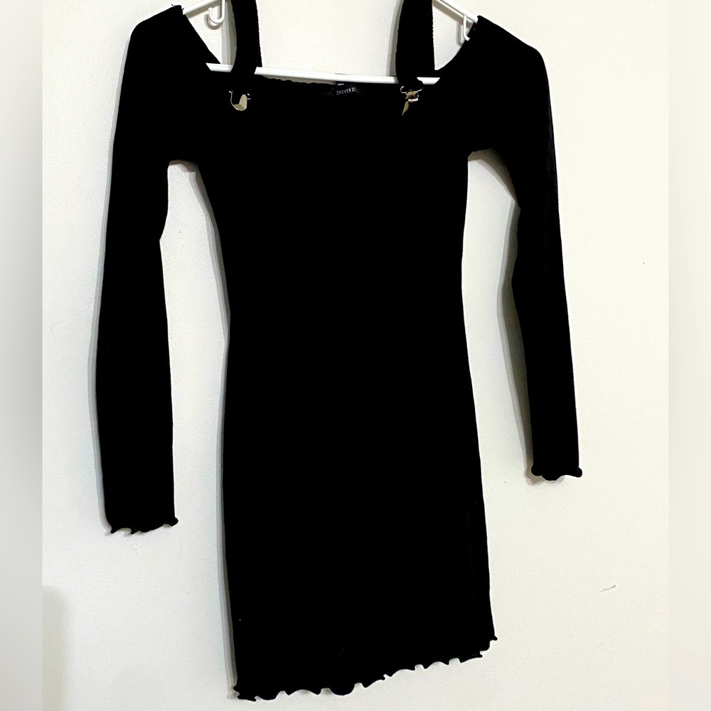 black tight fitting long sleeve dress